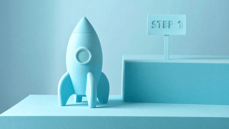 Minimalist light blue rocket figurine on a platform next to a sign that reads ‘STEP 1,’ symbolizing the beginning or launch of a process.